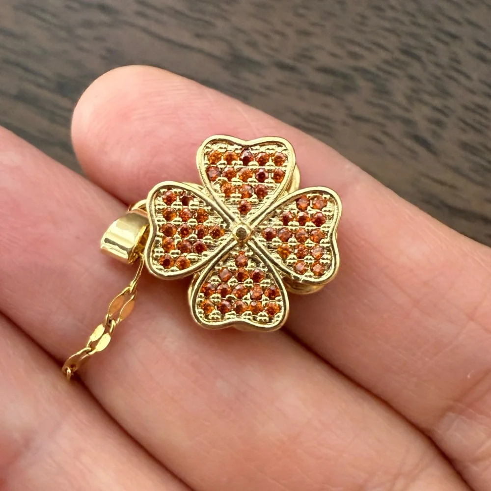 Pave set orange crystal gold plated stainless steel clover pendant and chain - Picture 4 of 8